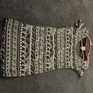 White and black dress with a heart cut out in back